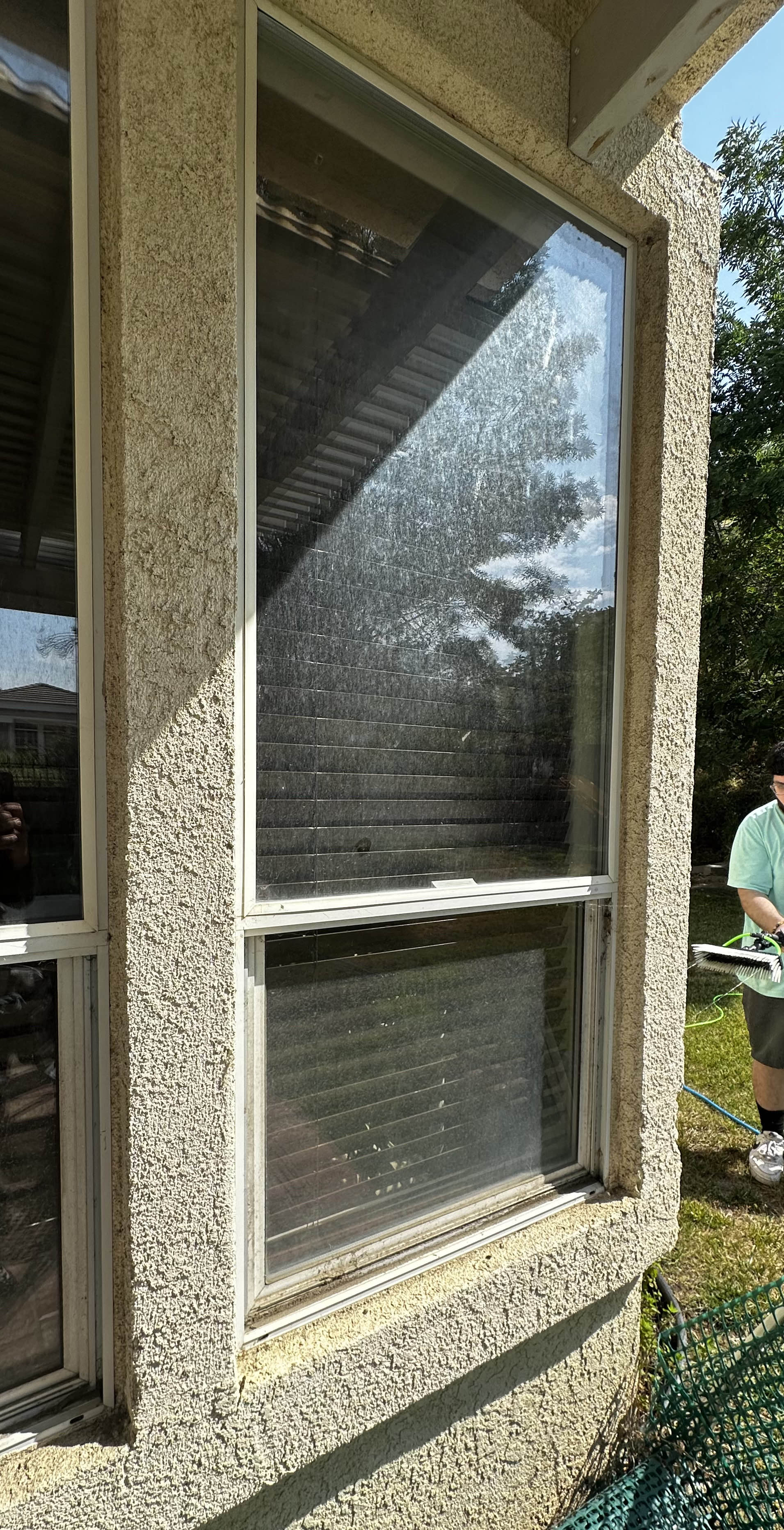 Dirty window before professional cleaning in Southern California
